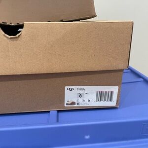 UGG Cream and Tan Fluffy Slippers